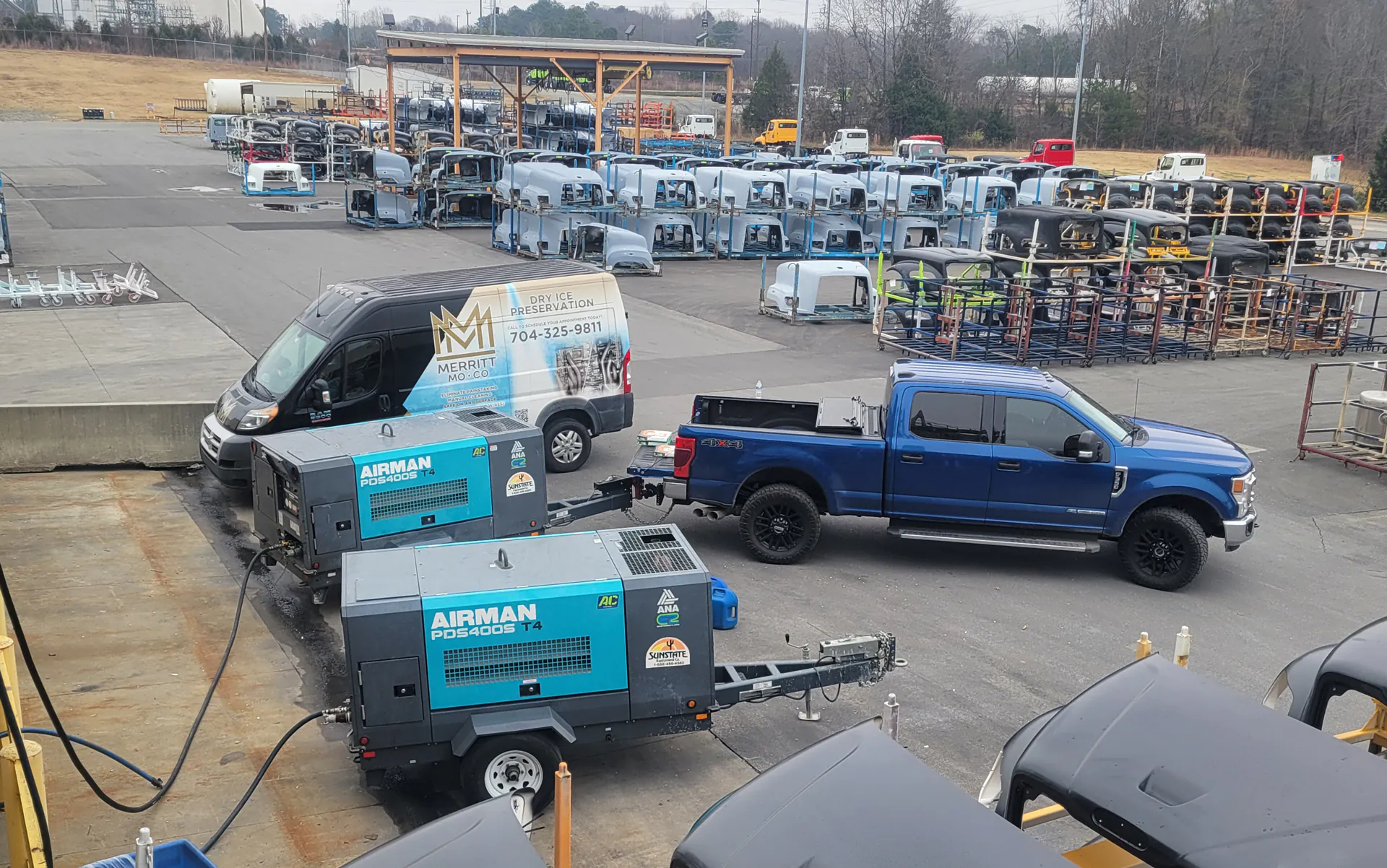 Merritt Industrial equipment staged on-site for an e-coat conveyor restoration project
