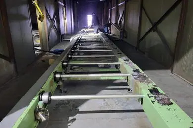 Technician cleaning real machinery